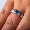 Elegant Sapphire Cathedral Ring in Twist Pattern